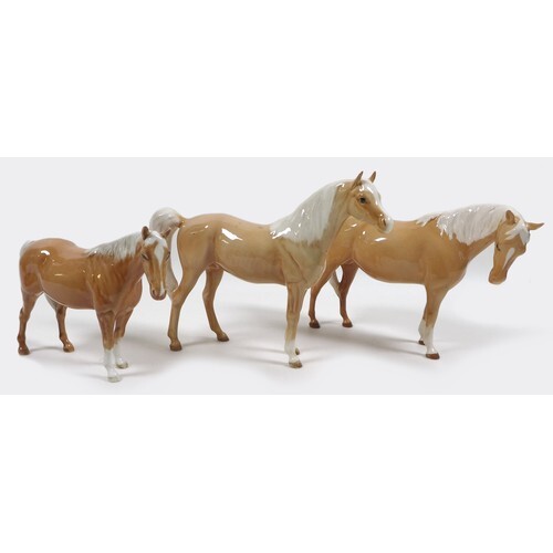 A group of three Beswick palomino horses, including 'Mare (F...