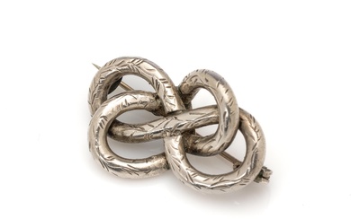 A heavy antique sterling silver solid double lover's knot brooch with hand engraved details, L: 32mm x 20mm