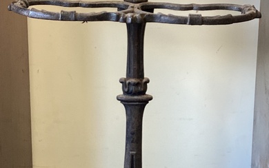 A large cast iron stick stand.