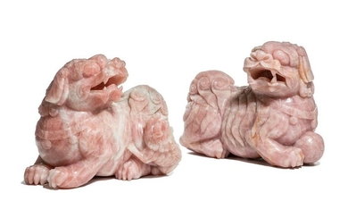 A large pair of Chinese rose quartz temple lions