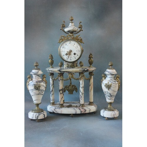 A late 19th century French dark veined white marble clock ga...