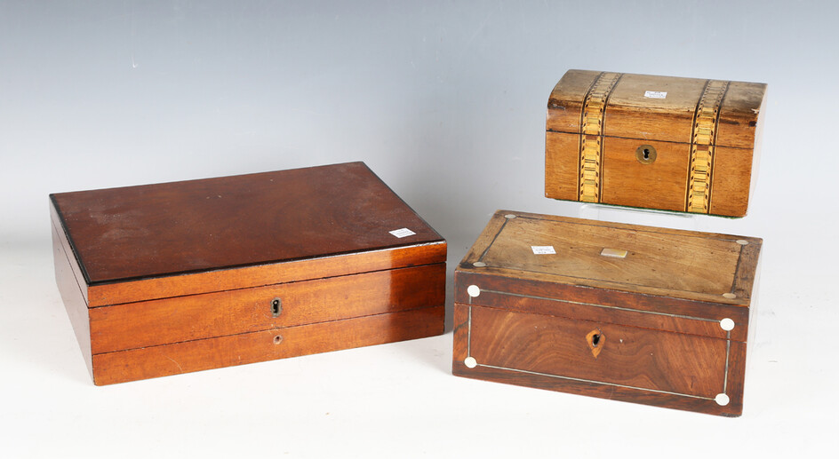 A late 19th century mahogany artist's paint box with hinged lid, compartmentalized interior and