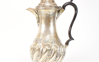 A late Victorian hallmarked silver coffee pot. The pot havin...