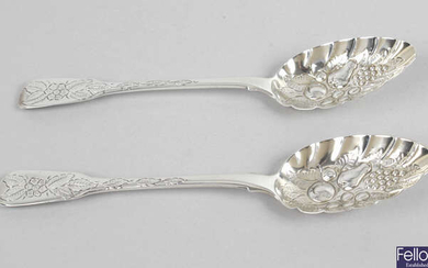 A matched pair of late George III silver 'berry' spoons.