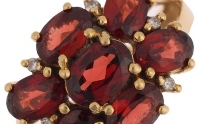 A modern 9ct gold garnet and diamond flowerhead cluster ring...