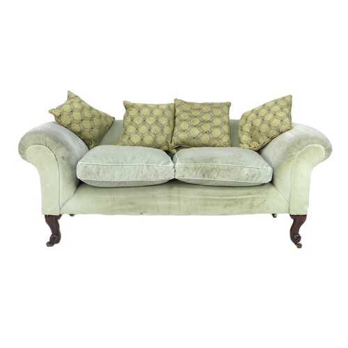 A modern Chesterfield style two seater settee, with scroll o...