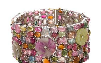 A multi-gem and silver bracelet