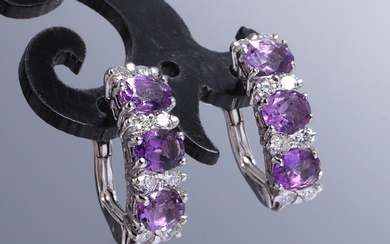 A pair of 18 kt amethyst and diamond studs. white gold, total 0.50 ct. (2)