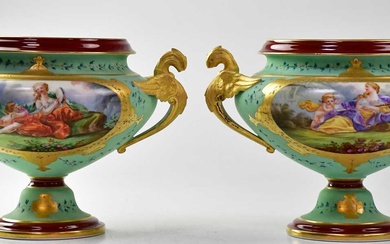 A pair of 19th century Continental twin-handled pedestal bowls of...