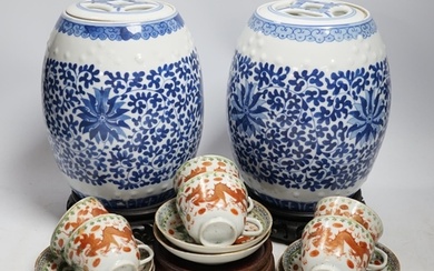A pair of Chinese blue and white barrel jars, various cups a...