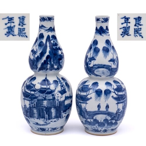 A pair of Chinese blue and white double gourd vases: each pa...