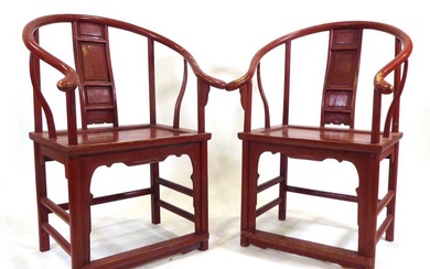A pair of Chinese red painted Ming-style armchairs of cow...