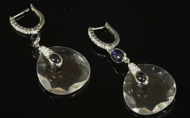A pair of Continental white gold rock crystal quartz, sapphire and diamond drop earrings