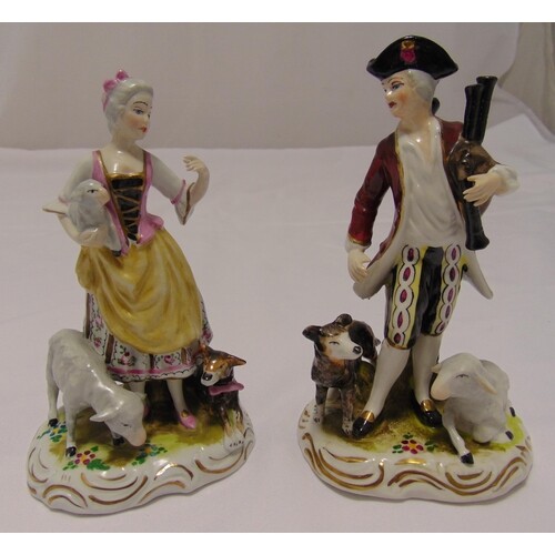 A pair of continental figurines of a shepherd and shepherdes...