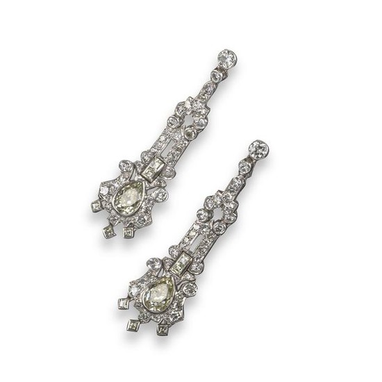 A pair of diamond drop earrings, of geometric...