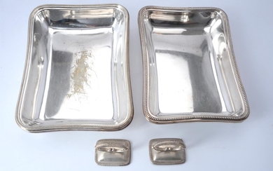 A pair of electro-plated rectangular entree dishes and covers with matched silver handles