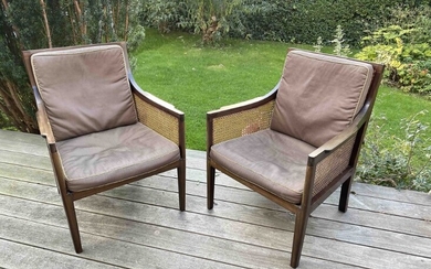 SOLD. A pair of mahogany armchairs. Sides and back fitted with wicker, 20th century H....