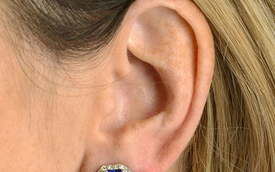 A pair of no heat sapphire and diamond cluster earrings.