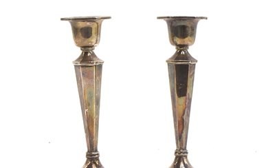 A pair of silver candlesticks by Walker & Hall, Sheffield 19...