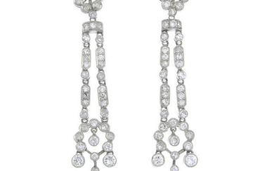 A pair of single-cut diamond and sapphire drop earrings.