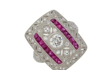 A platinum diamond and ruby openwork dress ring