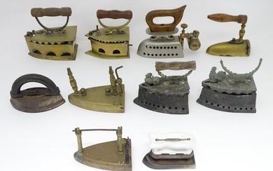 A quantity of assorted 19thC and later cast brass and iron flat irons, to include Feldmeyer spirit