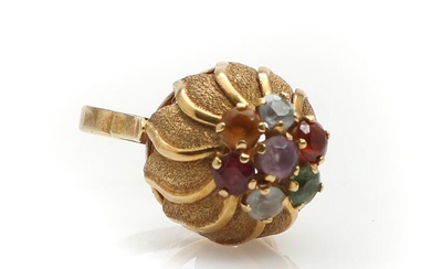A ring set with faceted citrine, amethyst, aquamarine a.o., mounted in 18k...