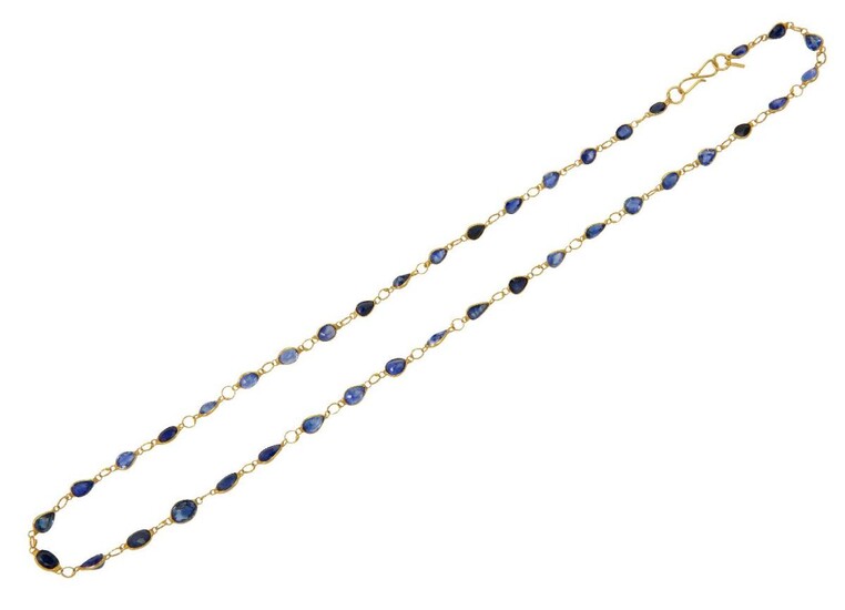 A sapphire necklace, composed of a line of pear and oval-cut sapphires in collet mounts with single-link connections, length 44cm