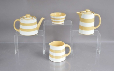 A set of four Cornishware items in cream and white colourway