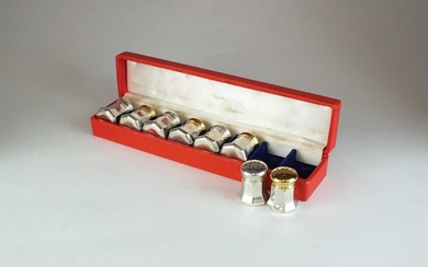 A set of silver gilt Cartier salt and pepper shakers