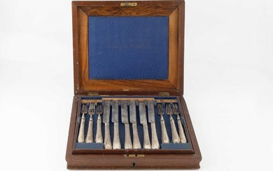 A set of twelve mid Victorian silver dessert knives and...