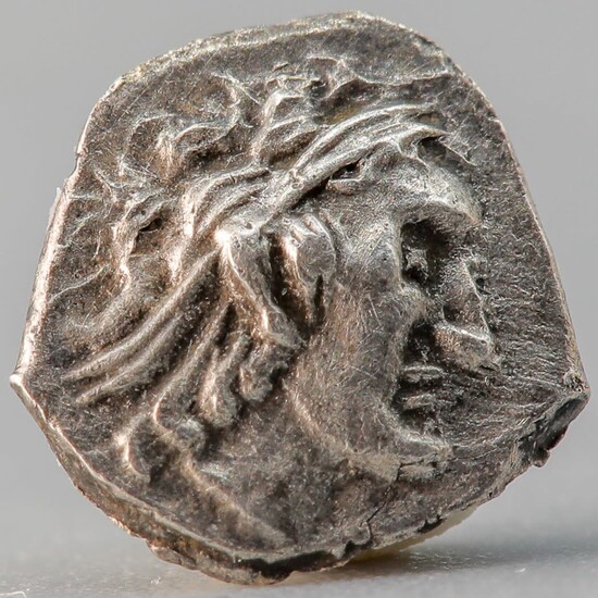 A silver coin of Yehuda under Ptolemaic rule. Obv.:...