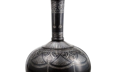 A silver-inlaid Indian bidri bottle, circa 1800