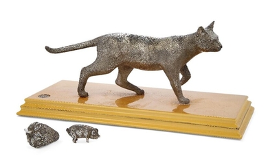 A silver model of a cat, by Theo Fennell, London, 1995, realistically modelled in walking pose with textured fur and raised on a rectangular lacquered wood base, 20cm long, 8.56cm high (exc. plinth), plinth 10.4 x 24.2cm, together with a miniature...