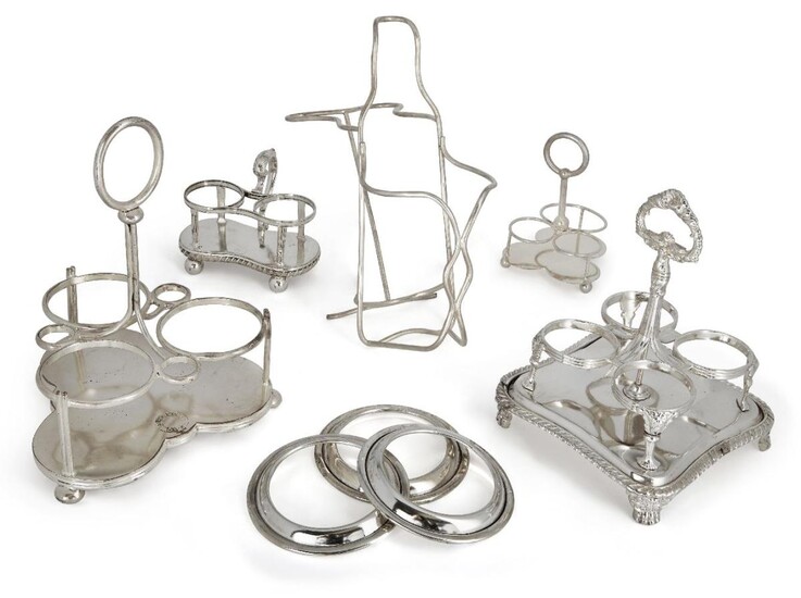A silver plated wine bottle coaster, together with a collection of silver plated cruet stands, most with Athenaeum Club crest, and eleven silver plated dish stands (a lot)