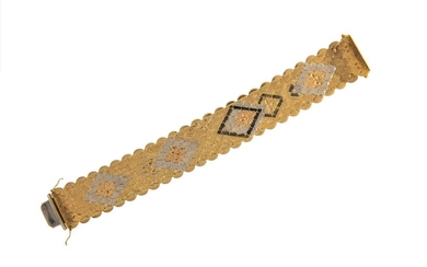 A three colour strap bracelet, c.1960, of textured design, length 19cm, width 2.5cm