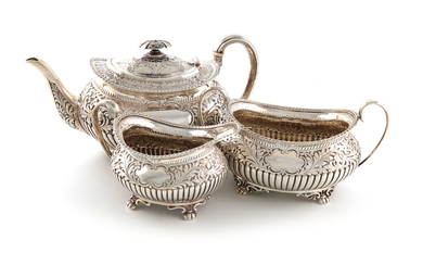 λA three-piece late-Victorian silver tea set