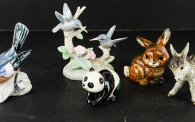 A vintage Beswick panda bear figurine, a Goebel rabbit and...