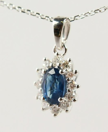 AN 18CT WHITE GOLD, SAPPHIRE AND DIAMOND PENDANT