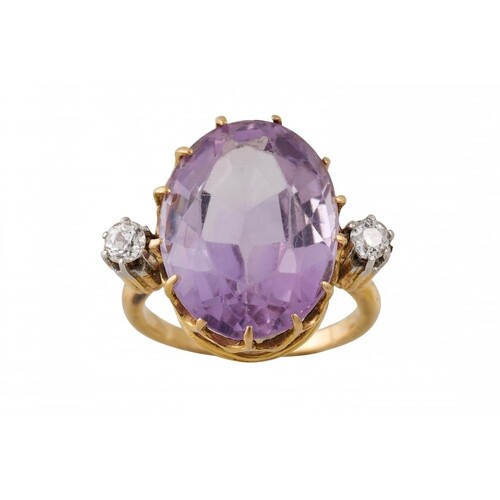 AN ANTIQUE AMETHYST AND DIAMOND RING, the large oval amethys...