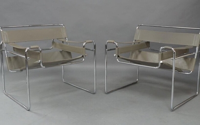 After Marcel Breuer, a pair of chrome Wassily style chairs, with grey leather (2)