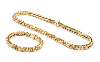 An 18ct gold ropetwist necklace, and matching bracelet, with flexible...