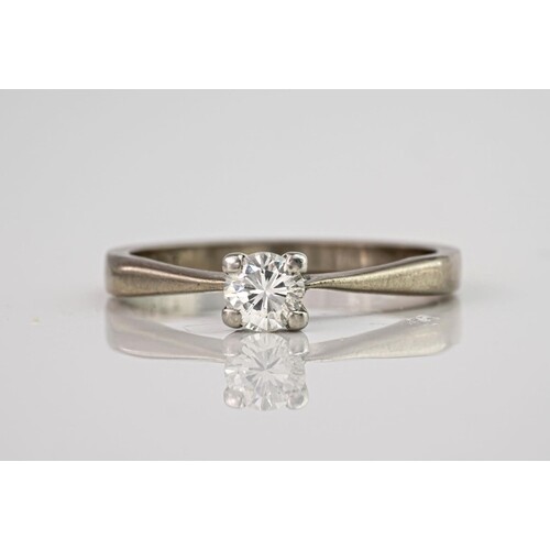 An 18ct white gold and diamond single stone ring, the brilli...