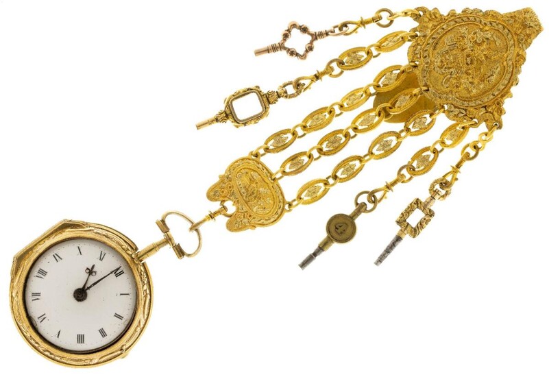 An 18th century gilt, pair cased verge pocket watch with chatelaine, the white enamel dial with Roman black numerals, steel, beetle and poker hands, the verge escapement with fusee, foliate engraved balance cock and foot, steel regulator wheel...