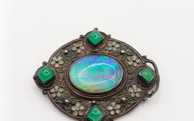 An Arts and Crafts silver coloured metal, opal, green stone ...