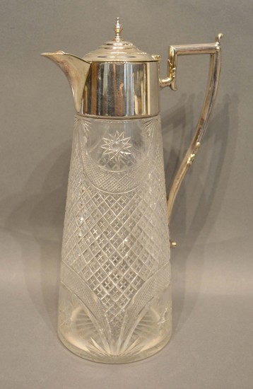 An Edwardian Silver Plated and Cut Glass Claret Jug with sha...