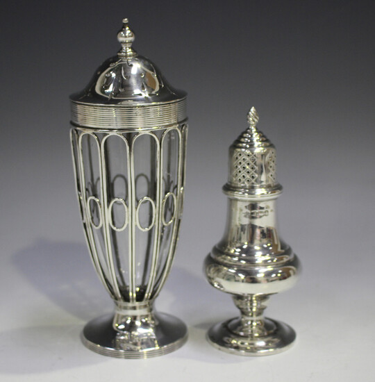 An Edwardian silver sugar caster of elongated ovoid wirework form, with pierced dome cover, on a cir