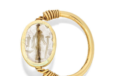 An Egyptian gold and rock crystal scarab ring