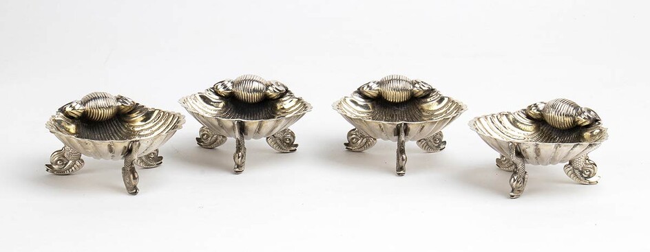 An English set of four Victorian sterling silver salt...