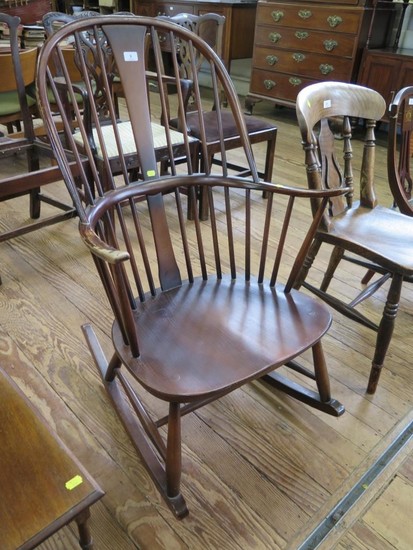 An Ercol stained beech and elm Windsor type rocking chair, w...